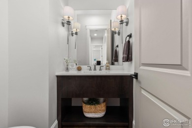 Step into this elegant home nestled in the prestigious Sanctuary on Highland Meadows Golf Course in Colorado - for sale on GolfHomes.com, golf home, golf lot
