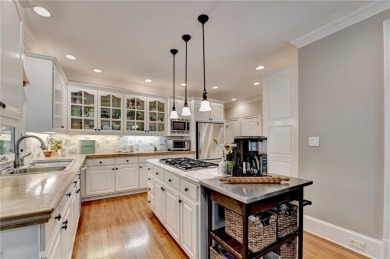 Presenting a traditional cedar shake Hamptons style home on St. Ives Golf and Country Club in Georgia - for sale on GolfHomes.com, golf home, golf lot