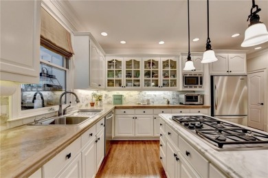 Presenting a traditional cedar shake Hamptons style home on St. Ives Golf and Country Club in Georgia - for sale on GolfHomes.com, golf home, golf lot