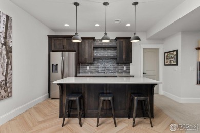 Step into this elegant home nestled in the prestigious Sanctuary on Highland Meadows Golf Course in Colorado - for sale on GolfHomes.com, golf home, golf lot