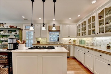 Presenting a traditional cedar shake Hamptons style home on St. Ives Golf and Country Club in Georgia - for sale on GolfHomes.com, golf home, golf lot