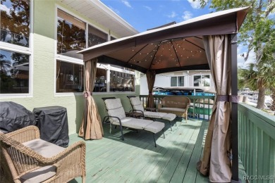 Introducing an exquisite property nestled in the beautiful on Plantation Inn and Golf Resort  in Florida - for sale on GolfHomes.com, golf home, golf lot