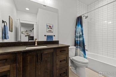 Step into this elegant home nestled in the prestigious Sanctuary on Highland Meadows Golf Course in Colorado - for sale on GolfHomes.com, golf home, golf lot
