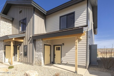 This great 2-bedroom 1.5 bath townhome is everything you need in on Headwaters Golf Course At Granby Ranch in Colorado - for sale on GolfHomes.com, golf home, golf lot