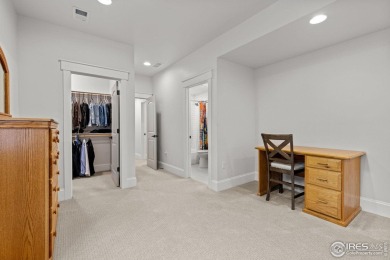 Step into this elegant home nestled in the prestigious Sanctuary on Highland Meadows Golf Course in Colorado - for sale on GolfHomes.com, golf home, golf lot