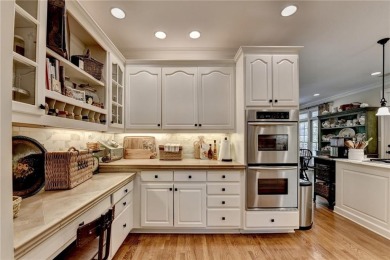 Presenting a traditional cedar shake Hamptons style home on St. Ives Golf and Country Club in Georgia - for sale on GolfHomes.com, golf home, golf lot