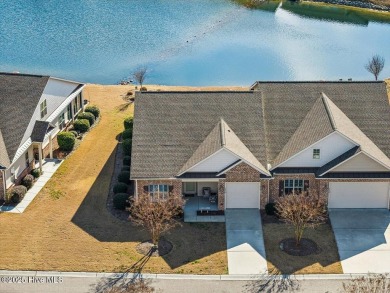 Experience the pleasures of coastal living in this charming on South Harbour Golf Links in North Carolina - for sale on GolfHomes.com, golf home, golf lot