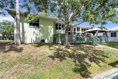 Introducing an exquisite property nestled in the beautiful on Plantation Inn and Golf Resort  in Florida - for sale on GolfHomes.com, golf home, golf lot