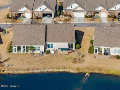 Experience the pleasures of coastal living in this charming on South Harbour Golf Links in North Carolina - for sale on GolfHomes.com, golf home, golf lot