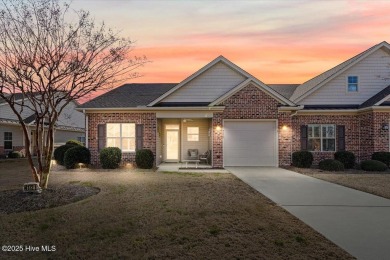 Experience the pleasures of coastal living in this charming on South Harbour Golf Links in North Carolina - for sale on GolfHomes.com, golf home, golf lot