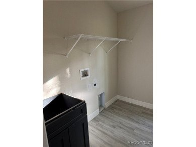 This meticulously crafted 2025 Genesis 2 model home boasts 3 on Southern Woods Golf Club in Florida - for sale on GolfHomes.com, golf home, golf lot