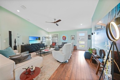 Constructed in 2021, this MODERN-STYLE residence in Rotonda West on Rotonda Golf and Country Club The Palms Course in Florida - for sale on GolfHomes.com, golf home, golf lot
