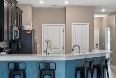 Welcome to this beautifully maintained 2-bedroom, 2-bathroom on ChampionsGate Golf Resort in Florida - for sale on GolfHomes.com, golf home, golf lot