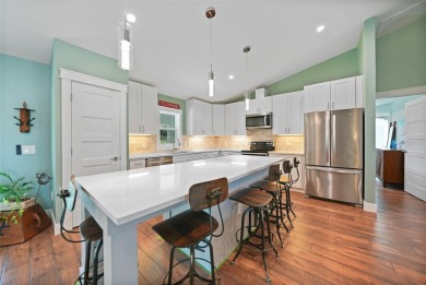 Constructed in 2021, this MODERN-STYLE residence in Rotonda West on Rotonda Golf and Country Club The Palms Course in Florida - for sale on GolfHomes.com, golf home, golf lot