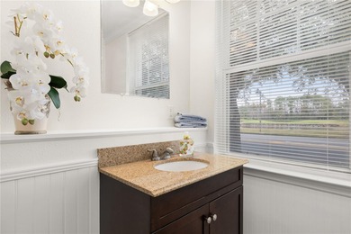 Wake up to peaceful golf course and water views in this on Celebration Golf Club in Florida - for sale on GolfHomes.com, golf home, golf lot