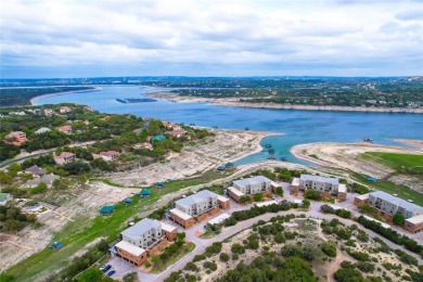 This home is open and bright, with floor-to-ceiling windows on Point Venture Golf Club on Lake Travis in Texas - for sale on GolfHomes.com, golf home, golf lot