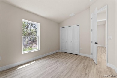 This home offers modern elegance and the tranquility of golf on Southern Woods Golf Club in Florida - for sale on GolfHomes.com, golf home, golf lot