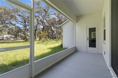 This home offers modern elegance and the tranquility of golf on Southern Woods Golf Club in Florida - for sale on GolfHomes.com, golf home, golf lot