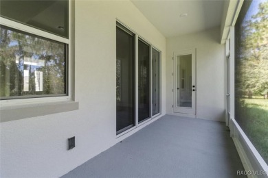 This home offers modern elegance and the tranquility of golf on Southern Woods Golf Club in Florida - for sale on GolfHomes.com, golf home, golf lot