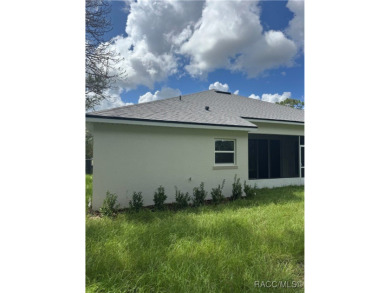This home offers modern elegance and the tranquility of golf on Southern Woods Golf Club in Florida - for sale on GolfHomes.com, golf home, golf lot