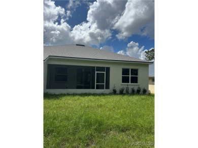 This home offers modern elegance and the tranquility of golf on Southern Woods Golf Club in Florida - for sale on GolfHomes.com, golf home, golf lot