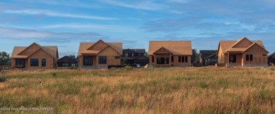 Welcome to 319 Bald Eagle Drive! This new construction home is a on Teton Reserve in Idaho - for sale on GolfHomes.com, golf home, golf lot