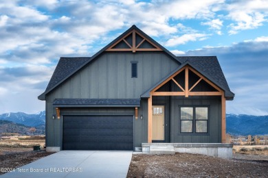 Welcome to 311 Bald Eagle Drive! This new construction home is a on Teton Reserve in Idaho - for sale on GolfHomes.com, golf home, golf lot