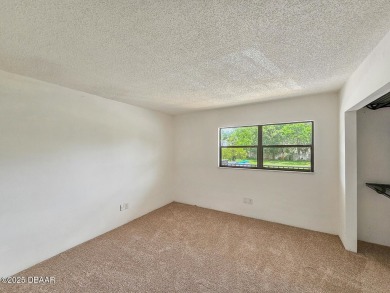 Step into this delightful one-bedroom second-floor condo, where on Daytona Beach Golf Club in Florida - for sale on GolfHomes.com, golf home, golf lot