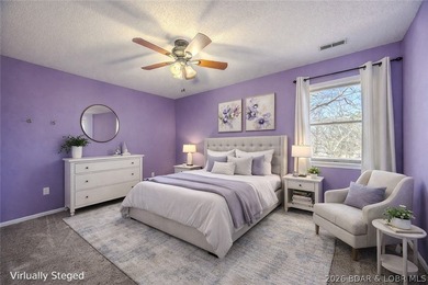 This isn't your typical lake condo-step inside and you'll feel on Lake Valley Country Club in Missouri - for sale on GolfHomes.com, golf home, golf lot