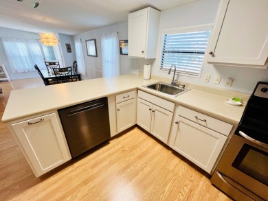 Welcome to this beautifully maintained 2-bedroom, 2-bath home in on Pine Lakes Country Club in Florida - for sale on GolfHomes.com, golf home, golf lot