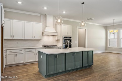 Welcome to your ideal coastal retreat! This beautiful 1.5 story on Crow Creek Golf Club in North Carolina - for sale on GolfHomes.com, golf home, golf lot