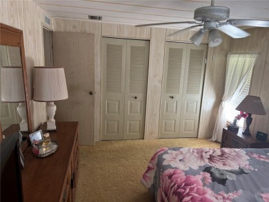 Spacious 2-bedroom, 2-bath home on a large corner lot with over on Zellwood Station Country Club in Florida - for sale on GolfHomes.com, golf home, golf lot