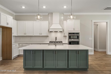 Welcome to your ideal coastal retreat! This beautiful 1.5 story on Crow Creek Golf Club in North Carolina - for sale on GolfHomes.com, golf home, golf lot