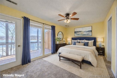 This isn't your typical lake condo-step inside and you'll feel on Lake Valley Country Club in Missouri - for sale on GolfHomes.com, golf home, golf lot