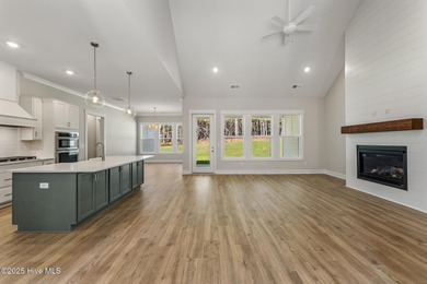 Welcome to your ideal coastal retreat! This beautiful 1.5 story on Crow Creek Golf Club in North Carolina - for sale on GolfHomes.com, golf home, golf lot