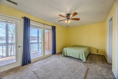 This isn't your typical lake condo-step inside and you'll feel on Lake Valley Country Club in Missouri - for sale on GolfHomes.com, golf home, golf lot