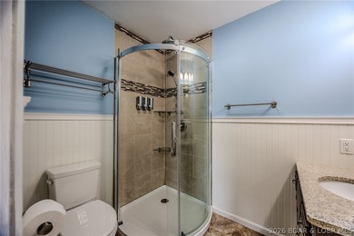 This isn't your typical lake condo-step inside and you'll feel on Lake Valley Country Club in Missouri - for sale on GolfHomes.com, golf home, golf lot