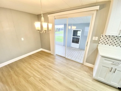 Remodeled Double-Wide manufactured home located in one of the on Barefoot Bay Golf Course in Florida - for sale on GolfHomes.com, golf home, golf lot