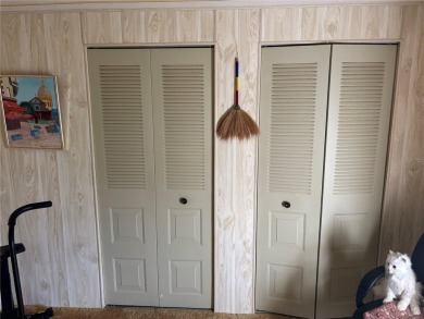 Spacious 2-bedroom, 2-bath home on a large corner lot with over on Zellwood Station Country Club in Florida - for sale on GolfHomes.com, golf home, golf lot