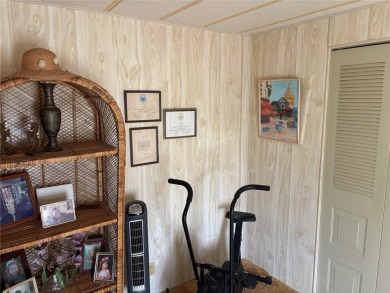 Spacious 2-bedroom, 2-bath home on a large corner lot with over on Zellwood Station Country Club in Florida - for sale on GolfHomes.com, golf home, golf lot