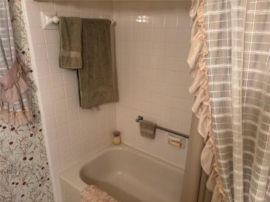 Spacious 2-bedroom, 2-bath home on a large corner lot with over on Zellwood Station Country Club in Florida - for sale on GolfHomes.com, golf home, golf lot