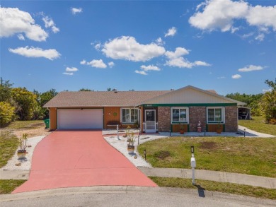 Tucked away on a quaint cul-de-sac, this WATERFRONT POOL HOME in on Duffys Golf Center in Florida - for sale on GolfHomes.com, golf home, golf lot