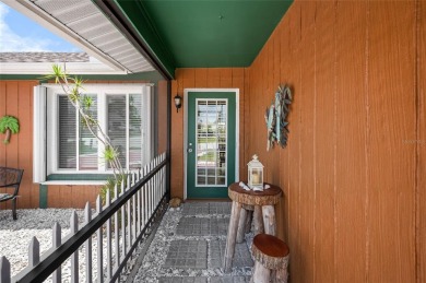 Tucked away on a quaint cul-de-sac, this WATERFRONT POOL HOME in on Duffys Golf Center in Florida - for sale on GolfHomes.com, golf home, golf lot