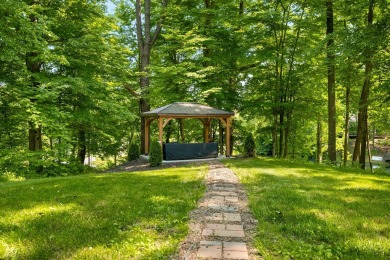 Welcome to this beautifully updated traditional two-story home on Foxcliff Golf Club in Indiana - for sale on GolfHomes.com, golf home, golf lot