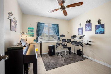 Tucked away on a quaint cul-de-sac, this WATERFRONT POOL HOME in on Duffys Golf Center in Florida - for sale on GolfHomes.com, golf home, golf lot