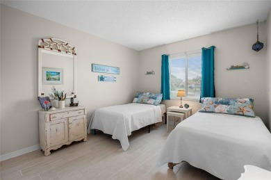 Tucked away on a quaint cul-de-sac, this WATERFRONT POOL HOME in on Duffys Golf Center in Florida - for sale on GolfHomes.com, golf home, golf lot