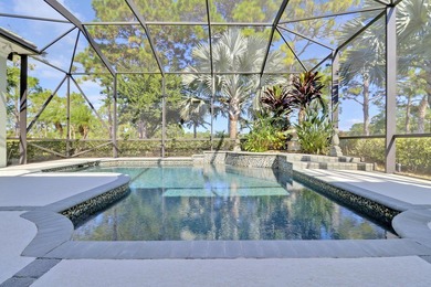 CUSTOM BUILT POOL HOME WITH GOLF & WATER VIEWS in the on The Legacy Golf and Tennis Club in Florida - for sale on GolfHomes.com, golf home, golf lot
