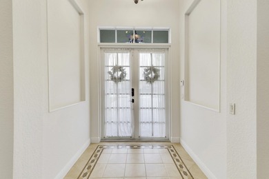 CUSTOM BUILT POOL HOME WITH GOLF & WATER VIEWS in the on The Legacy Golf and Tennis Club in Florida - for sale on GolfHomes.com, golf home, golf lot