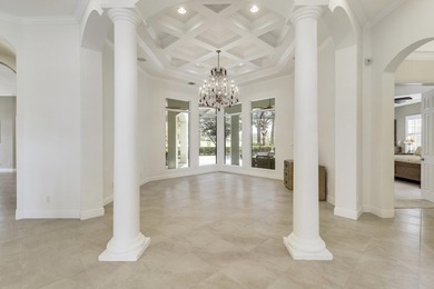 CUSTOM BUILT POOL HOME WITH GOLF & WATER VIEWS in the on The Legacy Golf and Tennis Club in Florida - for sale on GolfHomes.com, golf home, golf lot