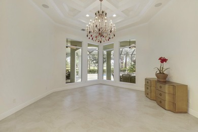 CUSTOM BUILT POOL HOME WITH GOLF & WATER VIEWS in the on The Legacy Golf and Tennis Club in Florida - for sale on GolfHomes.com, golf home, golf lot